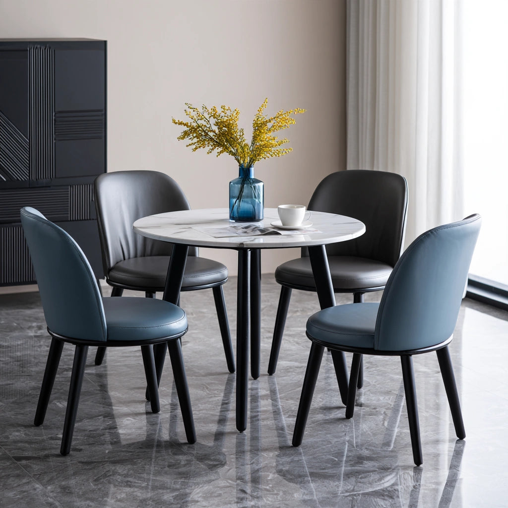 Theentryandexit white dining set with round marble-patterned table and four matching chairs for home dining areas.
