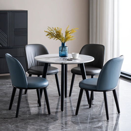 Theentryandexit white dining set with round marble-patterned table and four matching chairs for home dining areas.